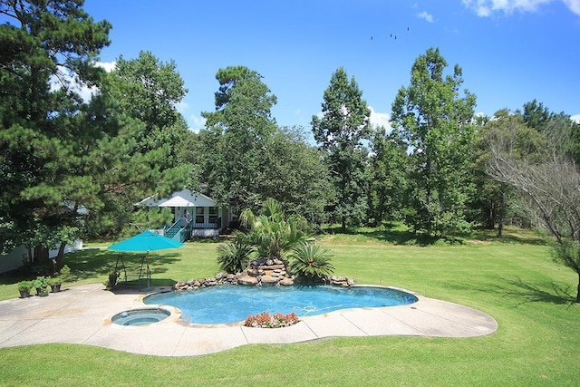 36218 Post Oak Cir, Magnolia, TX 77355 - view of swimming pool featuring a yard, a pool with connected hot tub, and a patio