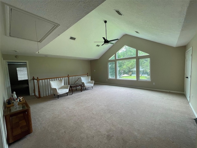 36218 Post Oak Cir, Magnolia, TX 77355 - unfurnished room featuring attic access, carpet floors, a textured ceiling, lofted ceiling, and a ceiling fan