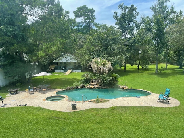 36218 Post Oak Cir, Magnolia, TX 77355 - view of swimming pool with a patio area, a lawn, a pool with connected hot tub, and view of scattered trees