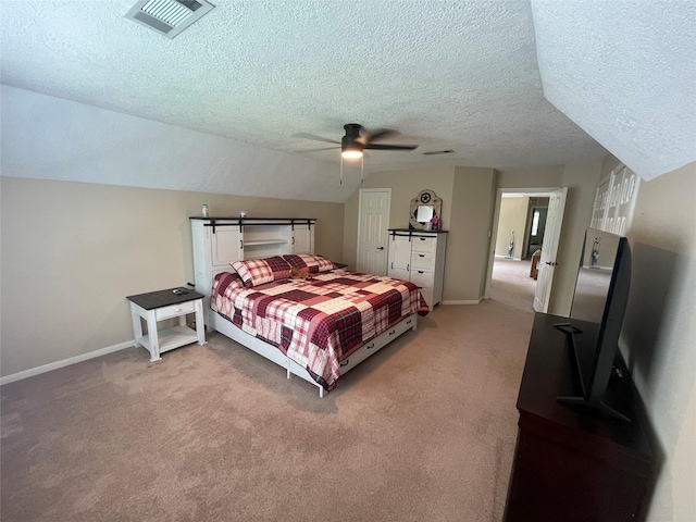 36218 Post Oak Cir, Magnolia, TX 77355 - bedroom featuring a textured ceiling, light carpet, and ceiling fan