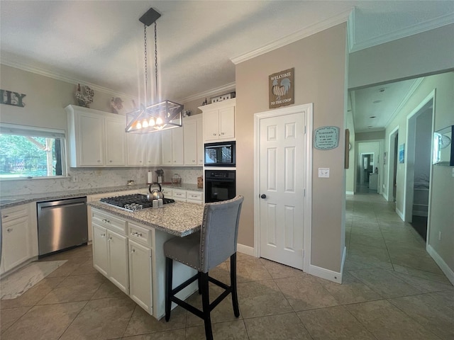 36218 Post Oak Cir, Magnolia, TX 77355 - kitchen featuring black appliances, crown molding, white cabinetry, dark tile patterned flooring, and tasteful backsplash