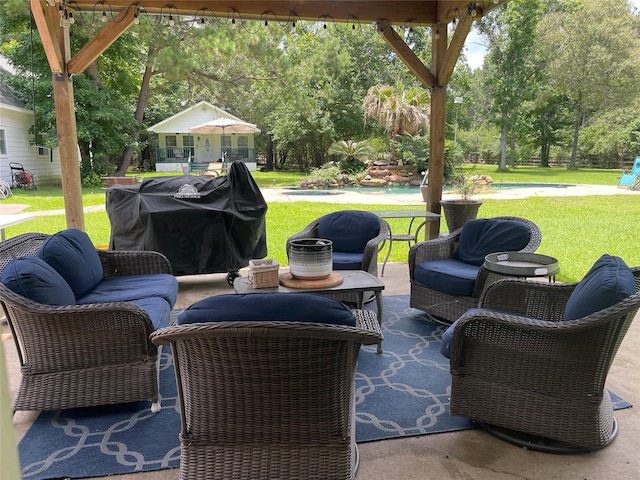 36218 Post Oak Cir, Magnolia, TX 77355 - view of patio featuring outdoor lounge area, grilling area, and view of scattered trees
