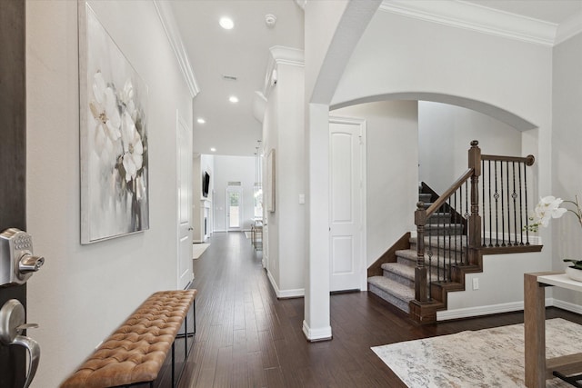 13223 Parkway Spring Dr, Houston, TX 77077 - entrance foyer with wood-type flooring, recessed lighting, arched walkways, stairs, and ornamental molding