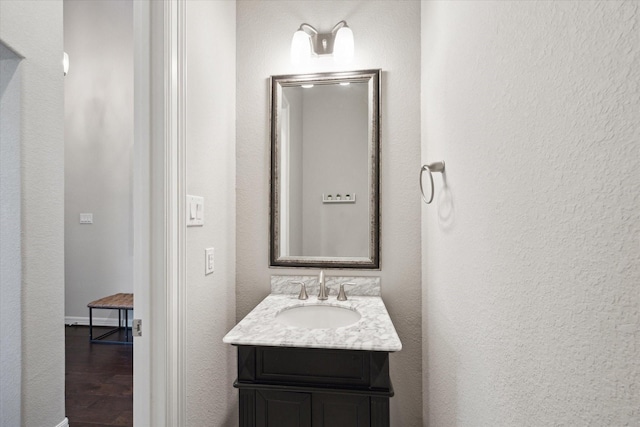 13223 Parkway Spring Dr, Houston, TX 77077 - bathroom with vanity and wood finished floors