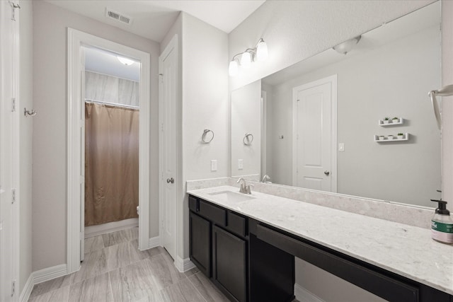 13223 Parkway Spring Dr, Houston, TX 77077 - full bath with vanity and a shower with shower curtain