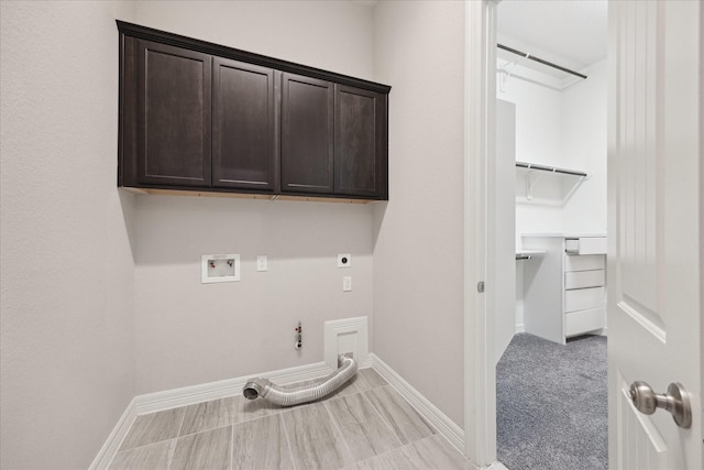 13223 Parkway Spring Dr, Houston, TX 77077 - washroom with hookup for a gas dryer, washer hookup, electric dryer hookup, and cabinet space