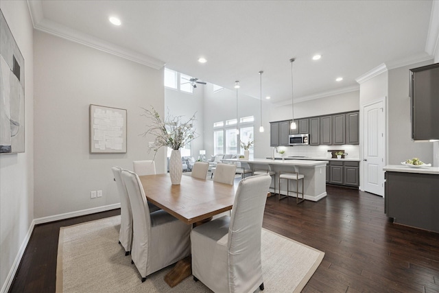 13223 Parkway Spring Dr, Houston, TX 77077 - dining area with crown molding, recessed lighting, dark wood-style floors, and ceiling fan