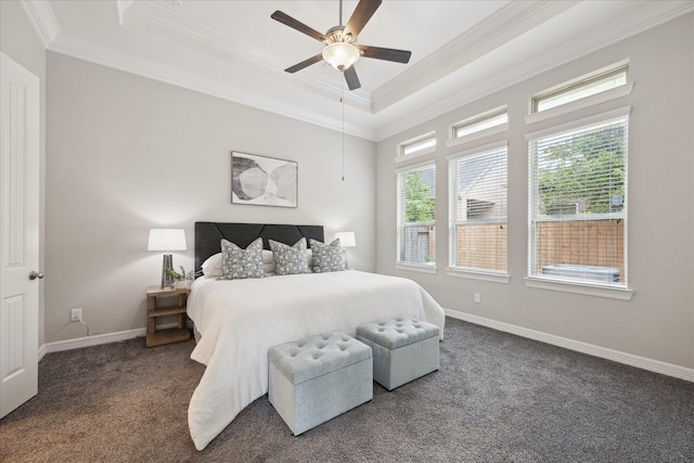 13223 Parkway Spring Dr, Houston, TX 77077 - bedroom with crown molding, a tray ceiling, dark carpet, and a ceiling fan