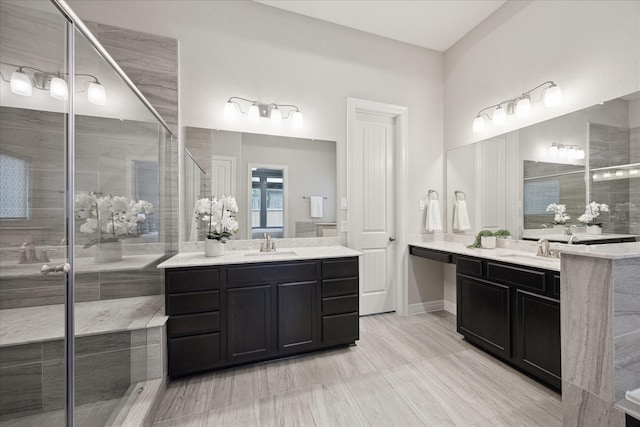 13223 Parkway Spring Dr, Houston, TX 77077 - full bathroom featuring a shower stall and two vanities