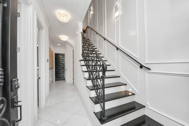 3711 Somerset Commons Ln, Houston, TX 77055 - stairs with tile patterned floors and baseboards