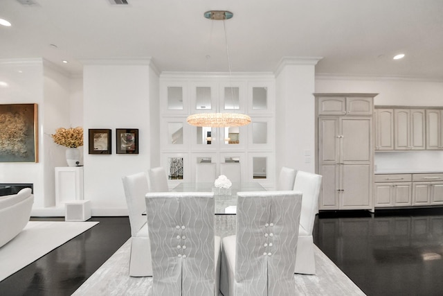 3711 Somerset Commons Ln, Houston, TX 77055 - dining room with crown molding, dark wood finished floors, and recessed lighting