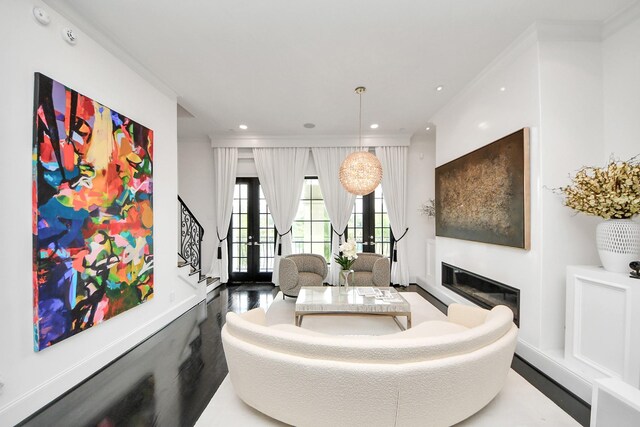 3711 Somerset Commons Ln, Houston, TX 77055 - living room with a glass covered fireplace, recessed lighting, wood finished floors, stairway, and crown molding