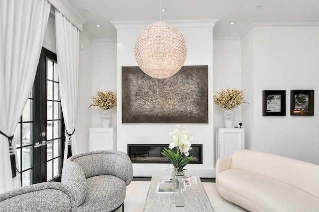 3711 Somerset Commons Ln, Houston, TX 77055 - living area featuring a chandelier, ornamental molding, a glass covered fireplace, recessed lighting, and wood finished floors