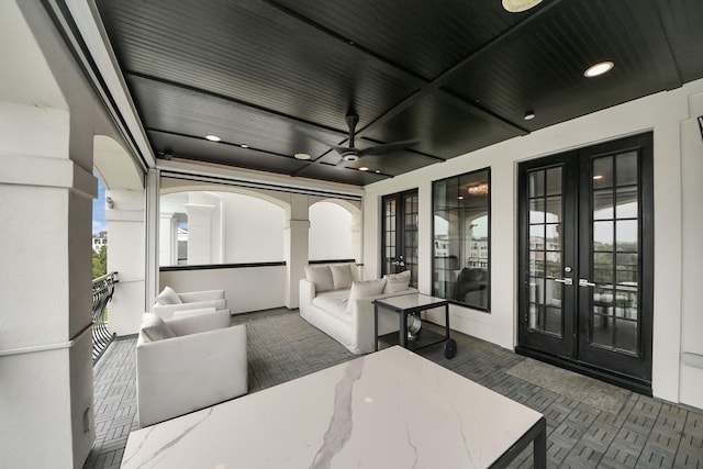 3711 Somerset Commons Ln, Houston, TX 77055 - sunroom featuring french doors and arched walkways