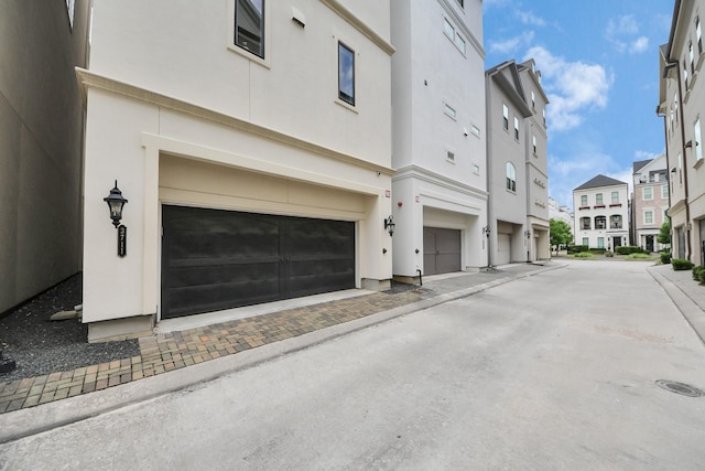 3711 Somerset Commons Ln, Houston, TX 77055 - view of road with street lights and a residential view