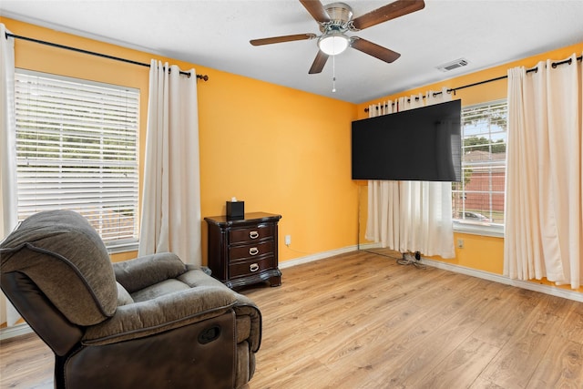 10422 Springland Ct, Houston, TX 77065 - living area with wood finished floors and ceiling fan