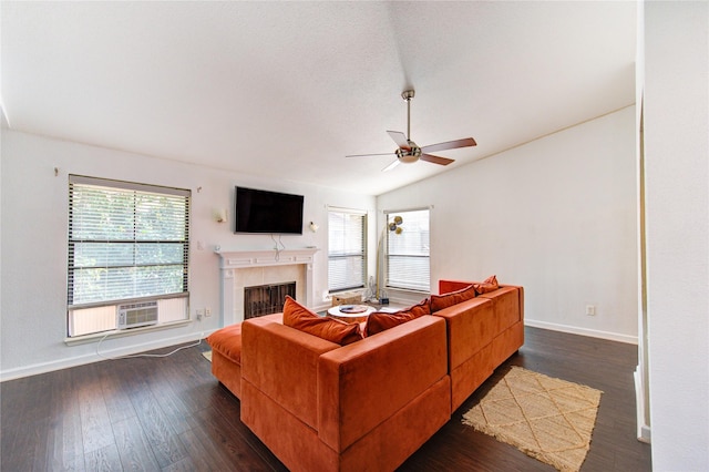 8100 Cambridge St Unit 114, Houston, TX 77054 - living area with a ceiling fan, a fireplace, vaulted ceiling, cooling unit, and dark wood finished floors