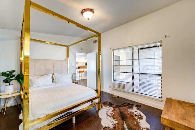 8100 Cambridge St Unit 114, Houston, TX 77054 - bedroom featuring wood finished floors