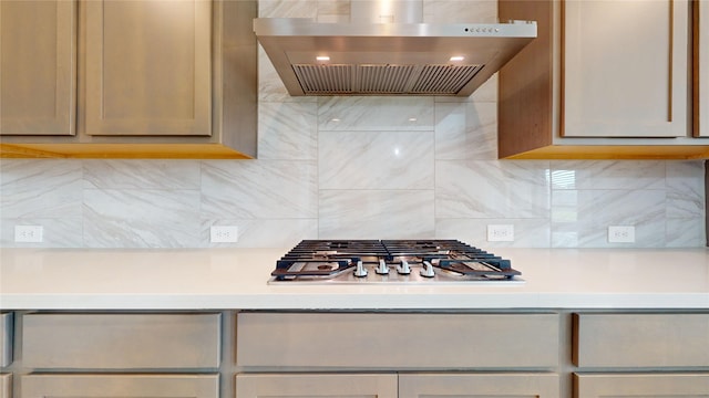 23604 Olive Creek Ln, New Caney, TX 77357 - kitchen with wall chimney exhaust hood, stainless steel gas cooktop, decorative backsplash, and light countertops