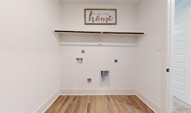 23604 Olive Creek Ln, New Caney, TX 77357 - laundry area with hookup for an electric dryer, washer hookup, wood finished floors, and hookup for a gas dryer