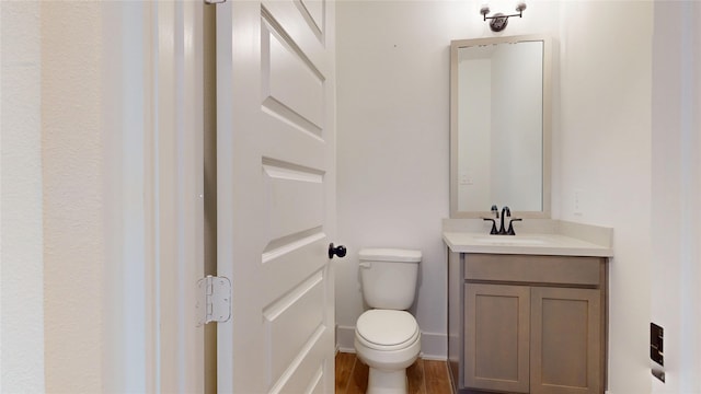 23604 Olive Creek Ln, New Caney, TX 77357 - bathroom featuring vanity and wood finished floors