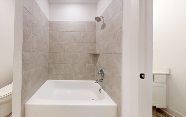 23604 Olive Creek Ln, New Caney, TX 77357 - bathroom featuring toilet and washtub / shower combination