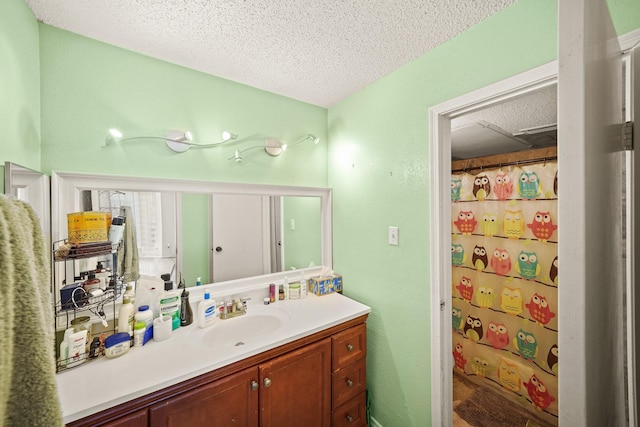 2120 El Paseo St Unit 1403, Houston, TX 77054 - bathroom with a textured ceiling, vanity, and a shower with curtain