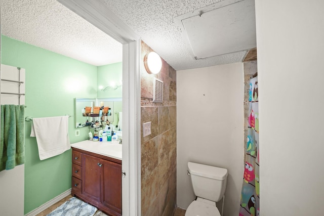 2120 El Paseo St Unit 1403, Houston, TX 77054 - bathroom with vanity, a textured ceiling, and a shower with shower curtain
