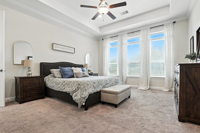 15415 Wildpoint Dr, Cypress, TX 77429 - bedroom featuring a tray ceiling, light carpet, a ceiling fan, and crown molding