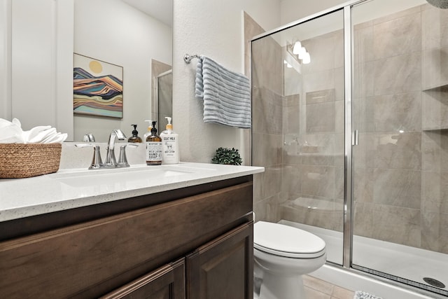 15415 Wildpoint Dr, Cypress, TX 77429 - full bath featuring vanity, a shower stall, tile patterned floors, and a textured wall