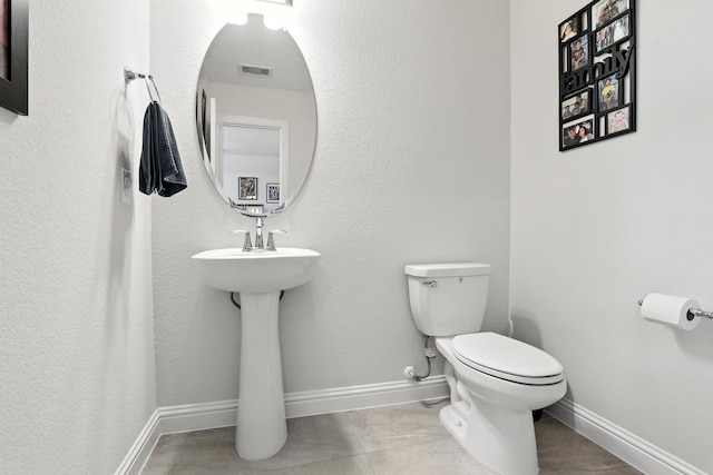 15415 Wildpoint Dr, Cypress, TX 77429 - bathroom featuring toilet and tile patterned flooring