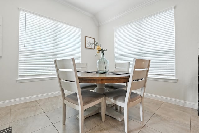 15415 Wildpoint Dr, Cypress, TX 77429 - dining area featuring ornamental molding, light tile patterned floors, and plenty of natural light