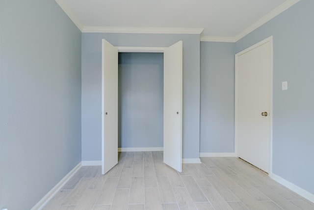4218 E Terrace Creek Cir, Houston, TX 77014 - unfurnished bedroom with crown molding, a closet, and light wood-type flooring