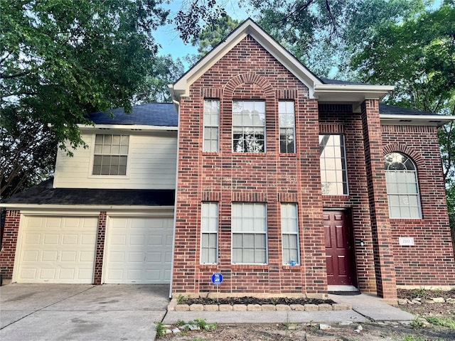 2702 Dovewood Ln, Spring, TX 77373 - traditional-style home with brick siding, concrete driveway, and a garage
