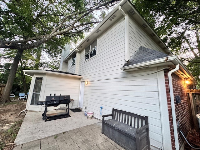 2702 Dovewood Ln, Spring, TX 77373 - rear view of property featuring a patio area and a chimney
