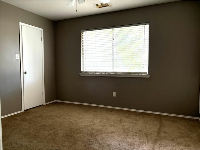 2702 Dovewood Ln, Spring, TX 77373 - spare room with carpet floors and ceiling fan