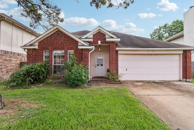 17006 Dusty Mill Dr E, Sugar Land, TX 77498 - view of front facade with brick siding, driveway, and a garage