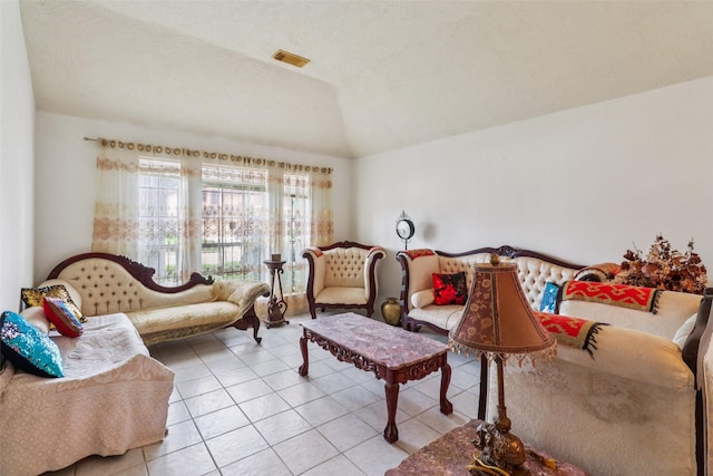 17006 Dusty Mill Dr E, Sugar Land, TX 77498 - living area with light tile patterned floors and vaulted ceiling