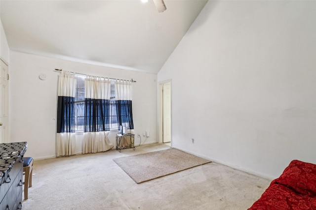 17006 Dusty Mill Dr E, Sugar Land, TX 77498 - carpeted living room with high vaulted ceiling and baseboards