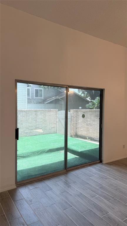 12922 Wirevine Ln, Houston, TX 77072 - empty room with wood tiled floors