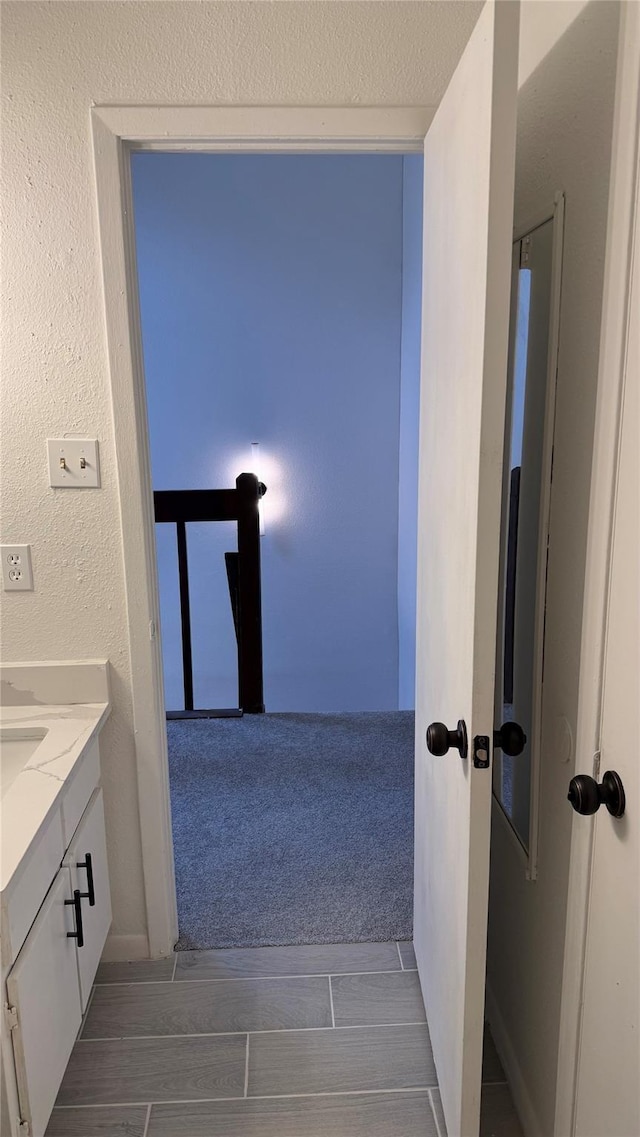 12922 Wirevine Ln, Houston, TX 77072 - bathroom featuring vanity and wood finish floors