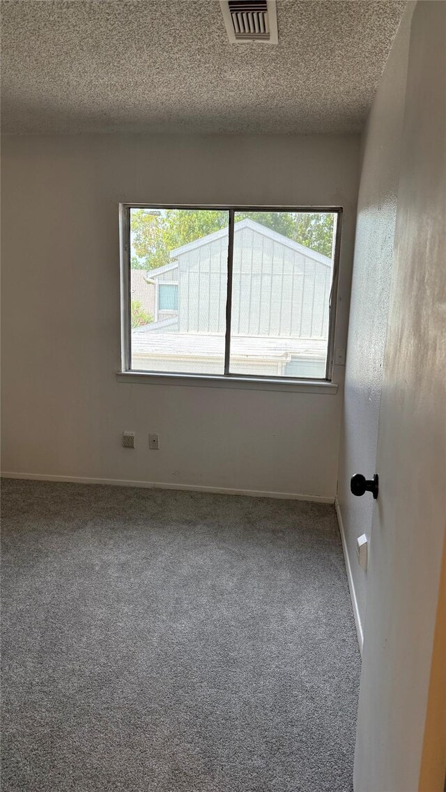 12922 Wirevine Ln, Houston, TX 77072 - carpeted spare room featuring a textured ceiling