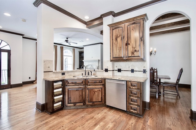 1241 W 24th St Unit C, Houston, TX 77008 - kitchen featuring dishwasher, arched walkways, crown molding, decorative backsplash, and a ceiling fan