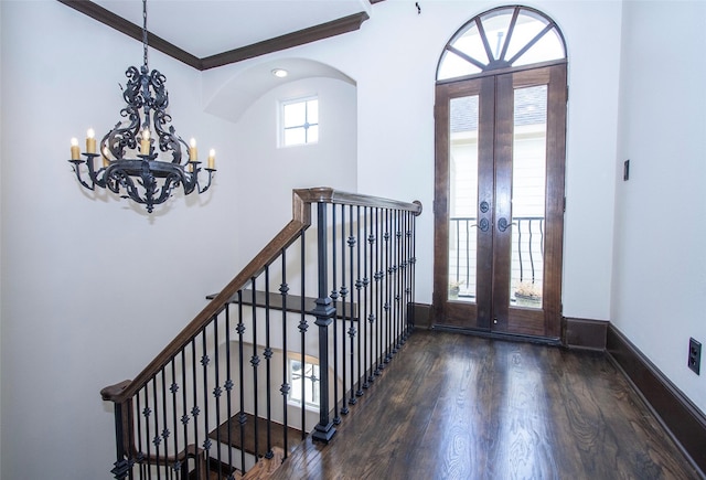 1241 W 24th St Unit C, Houston, TX 77008 - foyer featuring french doors, a chandelier, and wood finished floors