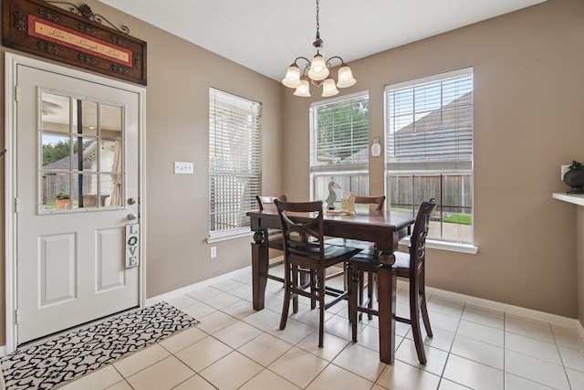 12103 Via San Rocco Ct, Cypress, TX 77429 - dining space featuring a chandelier and light tile patterned floors