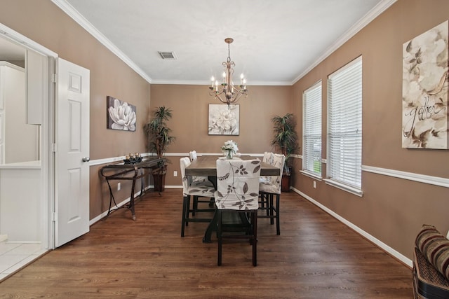 12103 Via San Rocco Ct, Cypress, TX 77429 - dining space with a chandelier, crown molding, and dark wood-type flooring