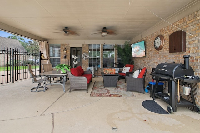 12103 Via San Rocco Ct, Cypress, TX 77429 - view of patio featuring an outdoor hangout area, grilling area, and ceiling fan