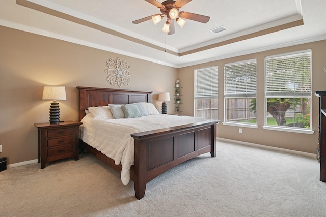 12103 Via San Rocco Ct, Cypress, TX 77429 - bedroom featuring a tray ceiling, light carpet, ornamental molding, and ceiling fan