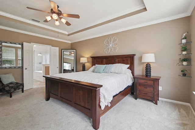 12103 Via San Rocco Ct, Cypress, TX 77429 - bedroom featuring light carpet, a raised ceiling, ornamental molding, a ceiling fan, and ensuite bath