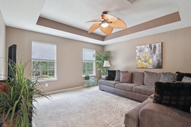 12103 Via San Rocco Ct, Cypress, TX 77429 - living area with a raised ceiling, carpet flooring, and ceiling fan